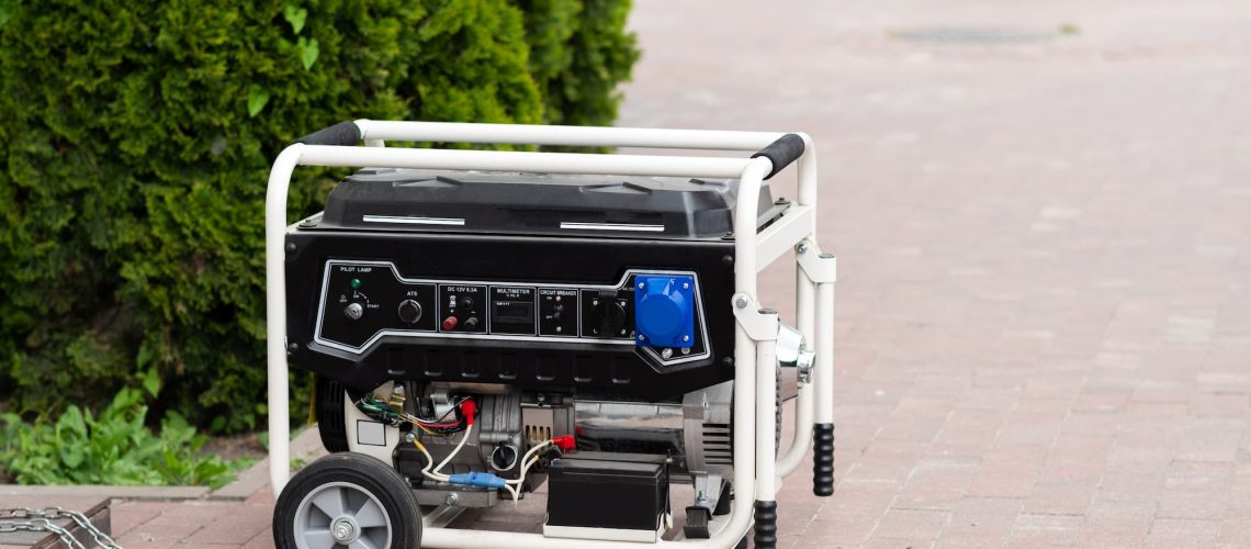 a white generator with wheels on it on a back porch