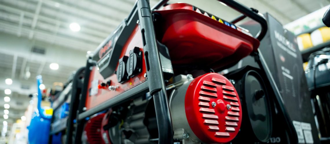 low angle view of a red home generator on a shelf